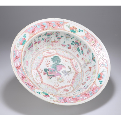 126 - A 19TH CENTURY CHINESE FAMILLE ROSE BASIN circular, painted in the typical palette with shishi, vase... 