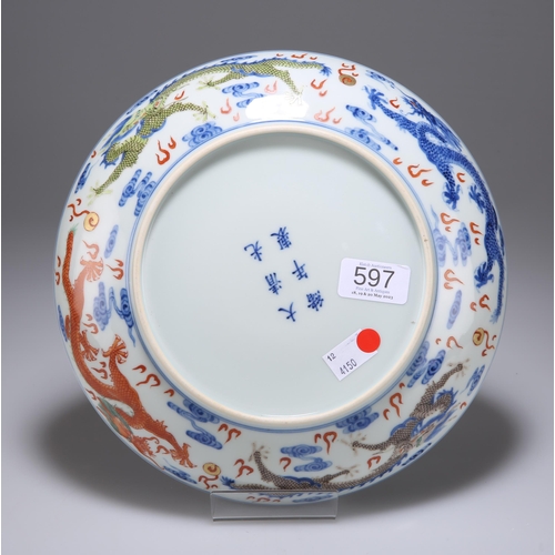 130 - A CHINESE DOUCAI DRAGON DISH circular, decorated in underglaze blue and enamel with five dragons, th... 