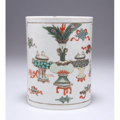 132 - A CHINESE FAMILLE VERTE BRUSHPOT cylindrical, enamel painted with objects and a figure. 13.5cm high... 