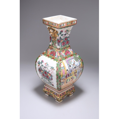 134 - A CANTONESE FAMILLE ROSE VASE ON STAND of square-section baluster form, painted in the characteristi... 