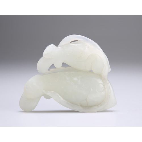 153 - A CHINESE CARVED JADE GROUP depicting two carp. 8.5cm wide