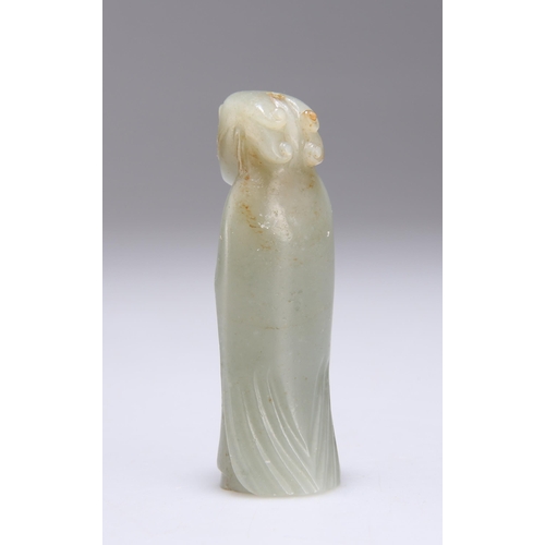 154 - A CHINESE CARVED JADE TOGGLE WEIGHT depicting a wise man. 7.2cm high