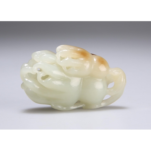 157 - A CHINESE CARVED JADE GROUP depicting a finger citron and beetle. 6.5cm long