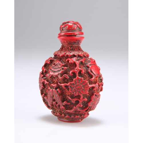 158 - A CHINESE CINNABAR LACQUER SNUFF BOTTLE 7.5cm high