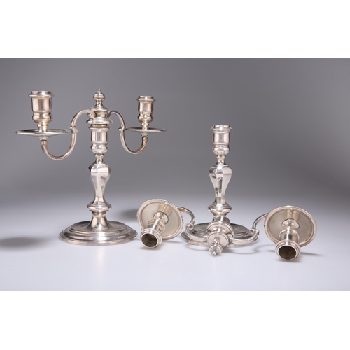 190 - A PAIR OF SILVER-PLATED TWO-LIGHT CANDELABRA by Garrard & Co, each with faceted knopped stem. (2... 