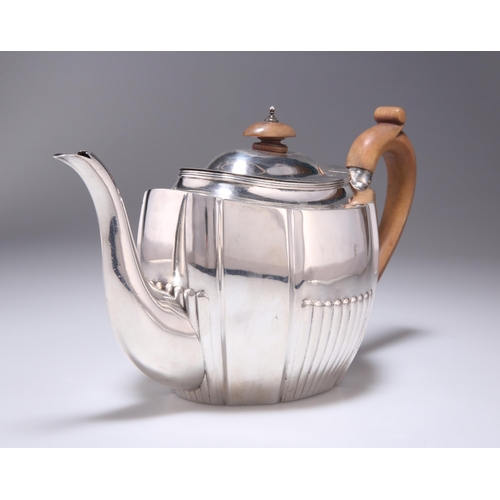 204 - A GEORGE III SILVER TEAPOT by Robert Hennell I & Samuel Hennell, London 1804, shaped oval, parti... 