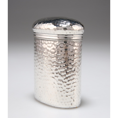 212 - AN EDWARDIAN SILVER TABLE JAR AND COVER by Finnigans Ltd, London 1903, oval, planished all over, wit... 