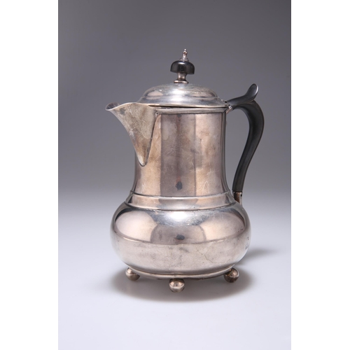 226 - A GEORGE V SILVER HOT WATER JUG by Harrison & Sons, Birmingham 1917, retailed by Harrison & ... 