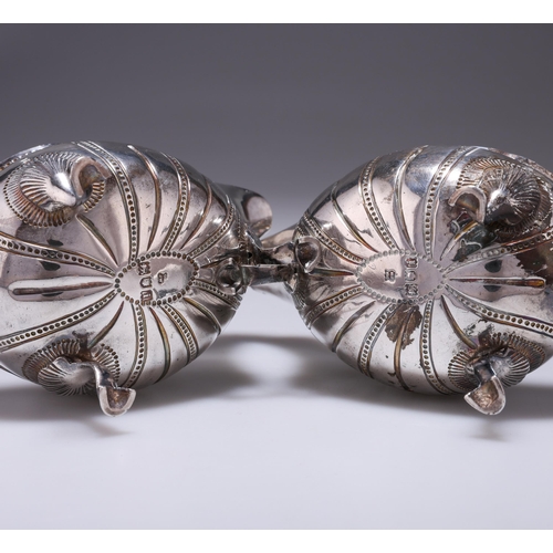 285 - A PAIR OF EDWARDIAN SILVER SAUCE BOATS, IN GEORGE III IRISH STYLE by Daniel & John Wellby, Londo... 