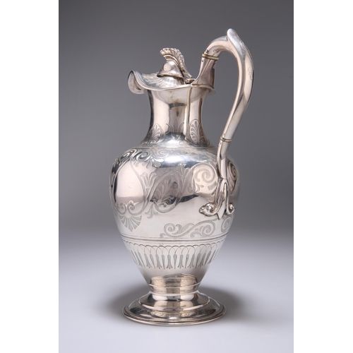 320 - § A VICTORIAN SILVER EWER by William Hunter, London 1857, of large proportions, baluster form, the h... 