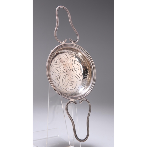 367 - A GEORGE III SILVER LEMON STRAINER maker's mark indistinct, London 1766, circular form with two hand... 