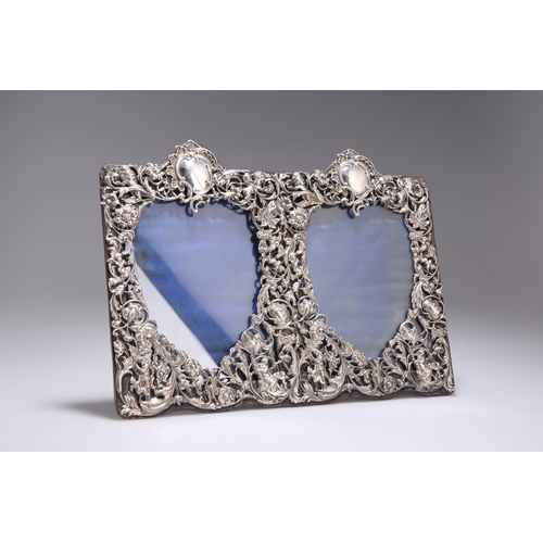 376 - A VICTORIAN SILVER-MOUNTED DOUBLE PHOTOGRAPH FRAME by William Comyns & Sons, London 1891, rectan... 