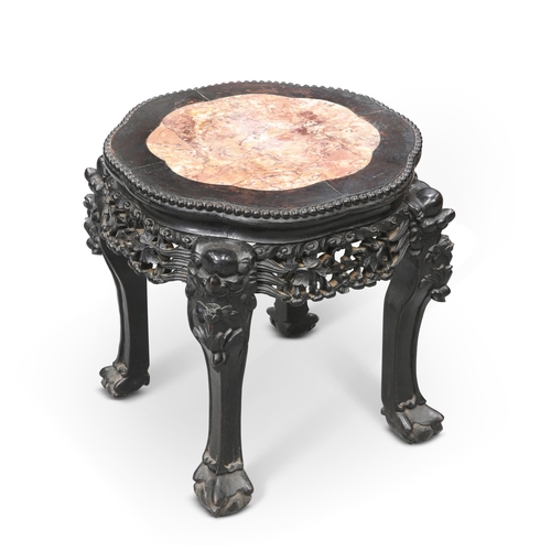 40 - A CHINESE MARBLE-INSET HARDWOOD STAND, CIRCA 1900 the shaped top with beaded edge, above a foliate c... 