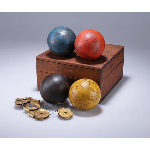 60 - A SET OF FOUR CROQUET BALLS, LATE VICTORIAN / EDWARDIAN in a wooden case with Jaques & Son Paten... 