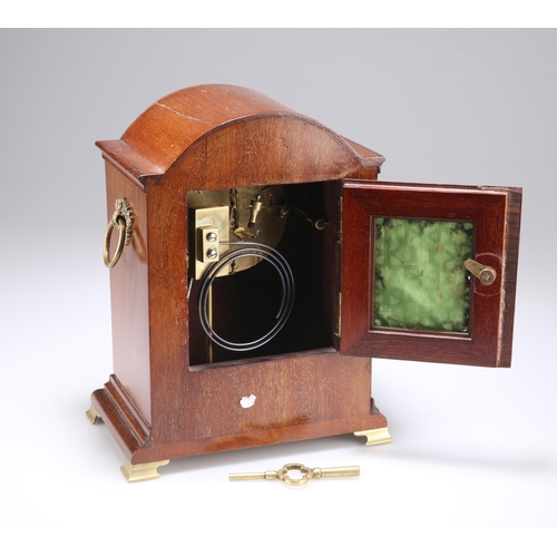 720 - AN EDWARDIAN INLAID MAHOGANY MANTLE CLOCK retailed by Goldsmiths and Silversmiths Company, the white... 