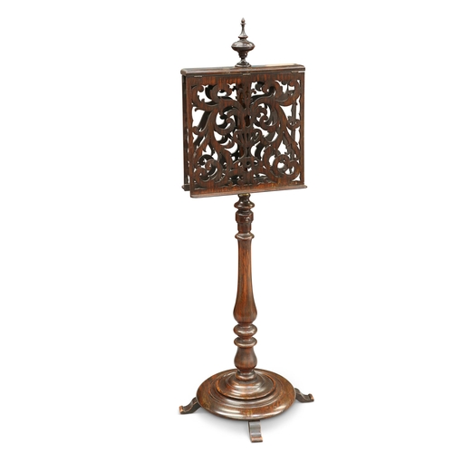 790 - A REGENCY ROSEWOOD DUET MUSIC STAND the urn-topped adjustable stem with twin fretwork-carved hinged ... 