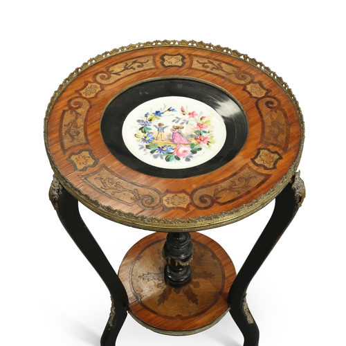 793 - A LATE 19TH CENTURY GILT METAL-MOUNTED, EBONISED AND INLAID GUÉRIDON the circular top inset with a p... 