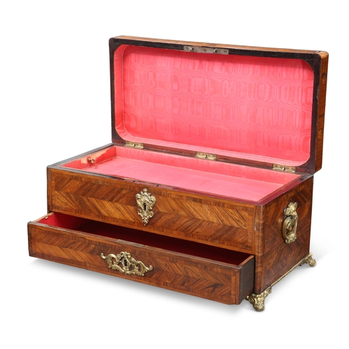 857 - A NAPOLEON III GILT METAL-MOUNTED KINGWOOD JEWELLERY BOX the rectangular top enclosing a silk lined ... 