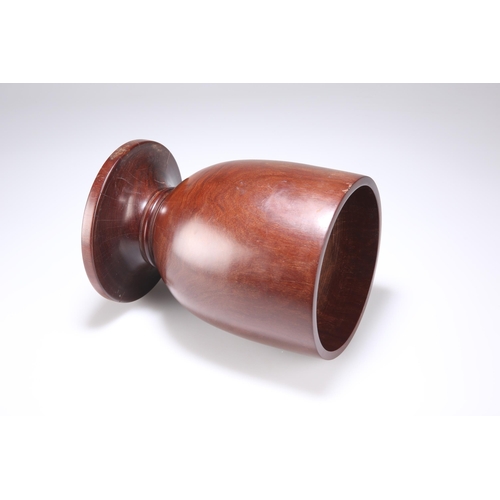 870 - A LIGNUM VITAE WASSAIL BOWL, 19TH CENTURY with plain circular bowl. 22cm high, 15.8cm diameter... 