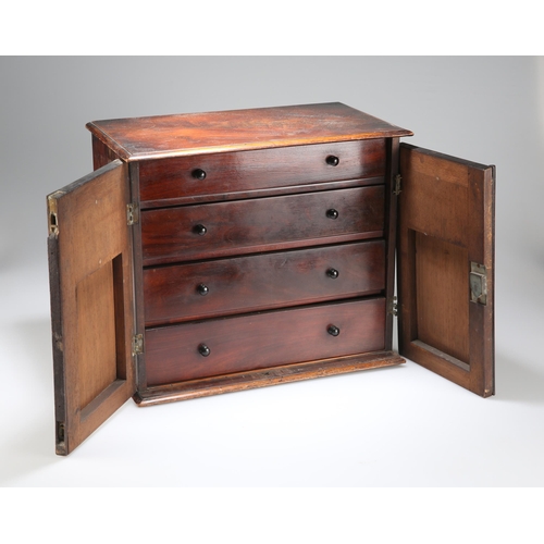 873 - A VICTORIAN MAHOGANY TABLE CABINET with twin doors opening to reveal four graduated drawers, each fi... 