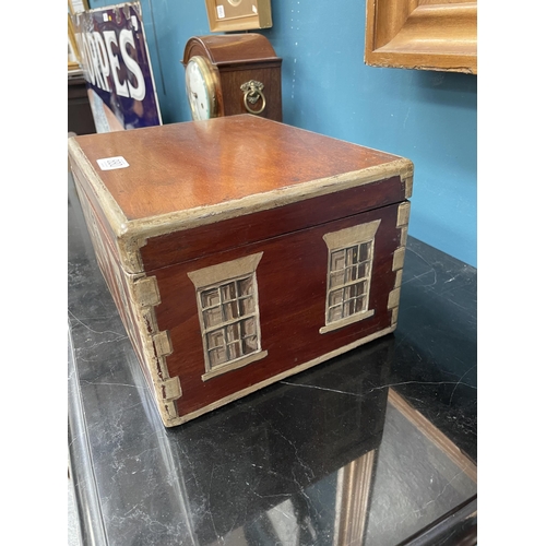 880 - A PAINTED MAHOGANY COTTAGE BOX painted to the front and sides with the facade of a house. 29.5cm wid... 