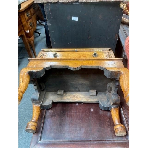 884 - AN 18TH CENTURY STYLE OAK MINIATURE BUREAU with fitted interior and drawer, raised on an integral st... 