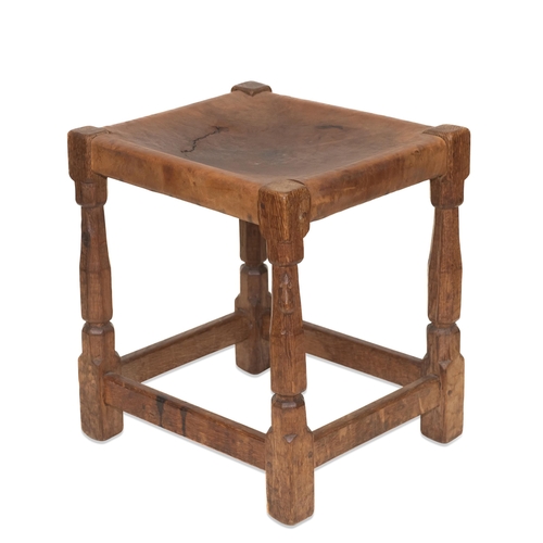 890 - ROBERT THOMPSON OF KILBURN, AN EARLY MOUSEMAN OAK STOOL, CIRCA 1930S dark patina, the leather seat r... 