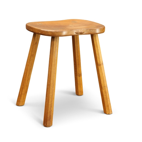 892 - ROBERT THOMPSON OF KILBURN, A MOUSEMAN OAK STOOL the waisted adzed seat raised on four faceted taper... 