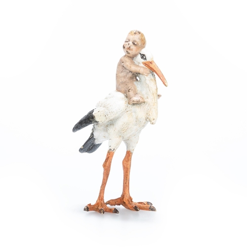 168 - A COLD PAINTED BRONZE MODEL OF A BABY-BEARING STORK bears a Bergman-type mark to the underside. 7cm ... 