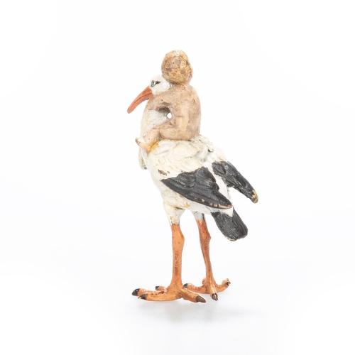 168 - A COLD PAINTED BRONZE MODEL OF A BABY-BEARING STORK bears a Bergman-type mark to the underside. 7cm ... 