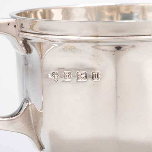 182 - A GEORGE V SILVER CHRISTENING MUG by Charles Boyton & Son Ltd, Birmingham 1919, of panelled circ... 