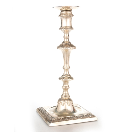 212 - A SET OF FOUR GEORGE III CAST SILVER CANDLESTICKS by Ebenezer Coker, London 1771, each detachable no... 