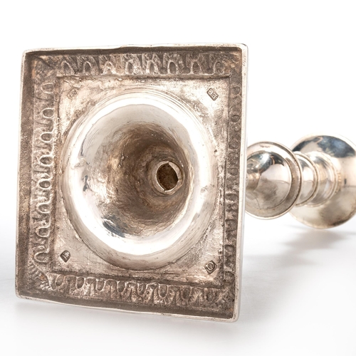 212 - A SET OF FOUR GEORGE III CAST SILVER CANDLESTICKS by Ebenezer Coker, London 1771, each detachable no... 