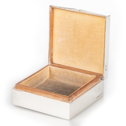 213 - AN ELIZABETH II SILVER AND ENAMEL CIGARETTE BOX by Albert Carter, Birmingham 1979, square, the hinge... 