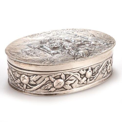 214 - A GERMAN SILVER BOX, LATE 19TH CENTURY Hanau, oval, the hinged cover chased a scene depicting a bear... 