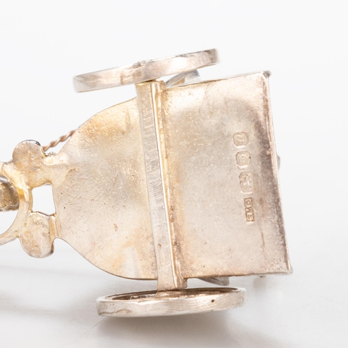 215 - A PAIR OF ELIZABETH II SILVER MODELS OF CHARIOTEERS maker S M D, London 1967 and 1968. (2) 8.5cm lon... 