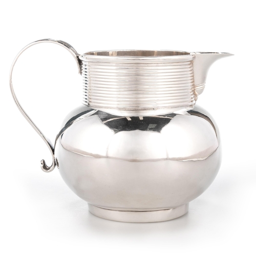 217 - A GEORGE II SILVER ALE JUG by Paul Crespin, London 1752, baluster form, with reeded collar and reede... 