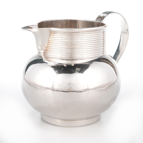 217 - A GEORGE II SILVER ALE JUG by Paul Crespin, London 1752, baluster form, with reeded collar and reede... 