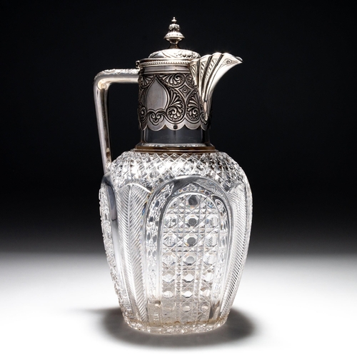 218 - A VICTORIAN SILVER-MOUNTED AND CUT-GLASS CLARET JUG by Atkin Brothers, Sheffield 1894, the hinged co... 