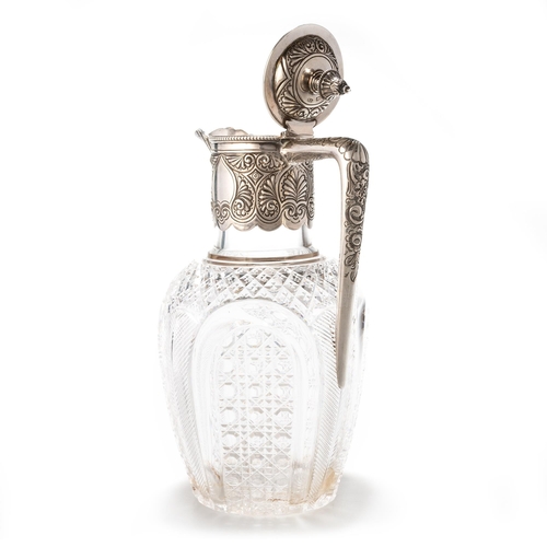 218 - A VICTORIAN SILVER-MOUNTED AND CUT-GLASS CLARET JUG by Atkin Brothers, Sheffield 1894, the hinged co... 