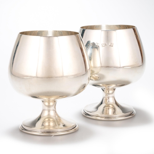 219 - A PAIR OF ELIZABETH II SILVER GOBLETS by A T Cannon Ltd, Birmingham 1972, the plain circular bowls r... 