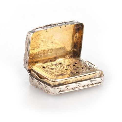 228 - A VICTORIAN SILVER VINAIGRETTE by David Pettifer, Birmingham 1850, of small proportions, shaped rect... 