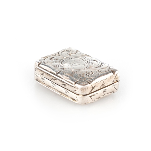 228 - A VICTORIAN SILVER VINAIGRETTE by David Pettifer, Birmingham 1850, of small proportions, shaped rect... 