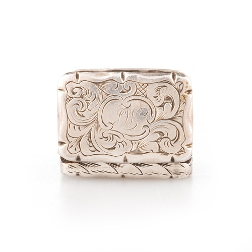 228 - A VICTORIAN SILVER VINAIGRETTE by David Pettifer, Birmingham 1850, of small proportions, shaped rect... 