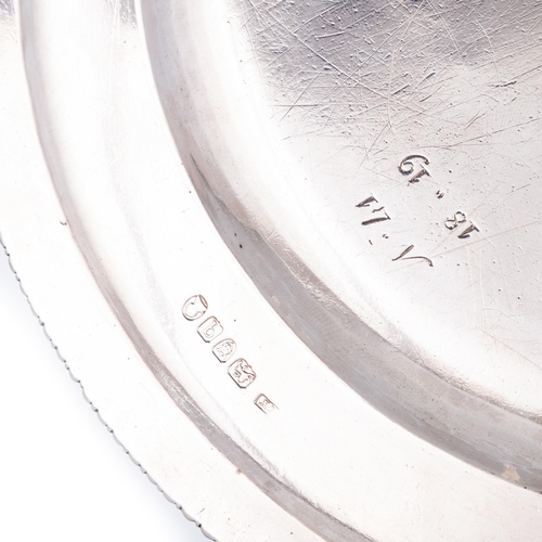 230 - A SET OF TWELVE GEORGE III SILVER DINNER PLATES by James Young, London 1791, circular with gadrooned... 