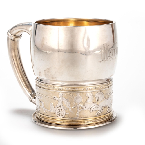 237 - AN AMERICAN STERLING SILVER-GILT MUG by Gorham, the bulbous upper bowl above a collar chased with ch... 