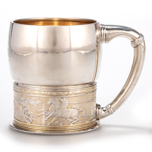 237 - AN AMERICAN STERLING SILVER-GILT MUG by Gorham, the bulbous upper bowl above a collar chased with ch... 