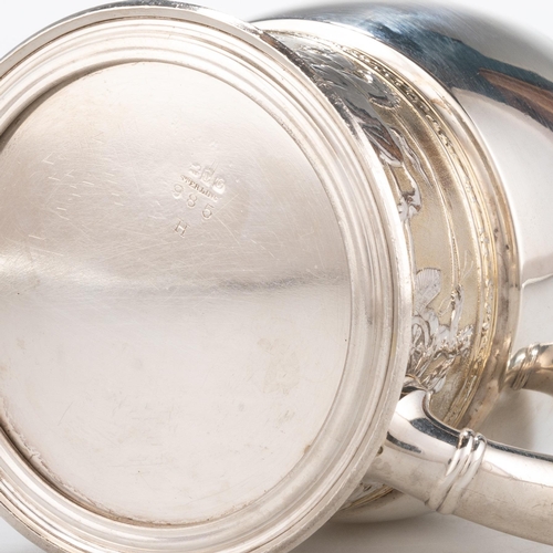 237 - AN AMERICAN STERLING SILVER-GILT MUG by Gorham, the bulbous upper bowl above a collar chased with ch... 