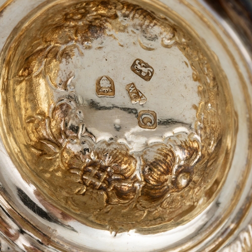 240 - A GEORGE III SILVER LIDDED TANKARD probably by William Collings, London 1778, of baluster form, the ... 