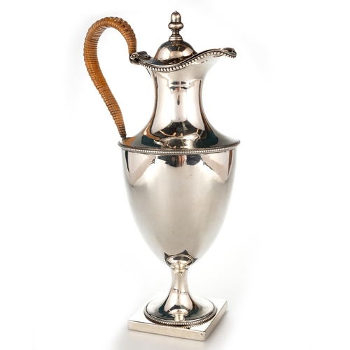 322 - A GEORGE III SILVER EWER by William Holmes, London 1777, of vase-form, with beaded borders, the cove... 